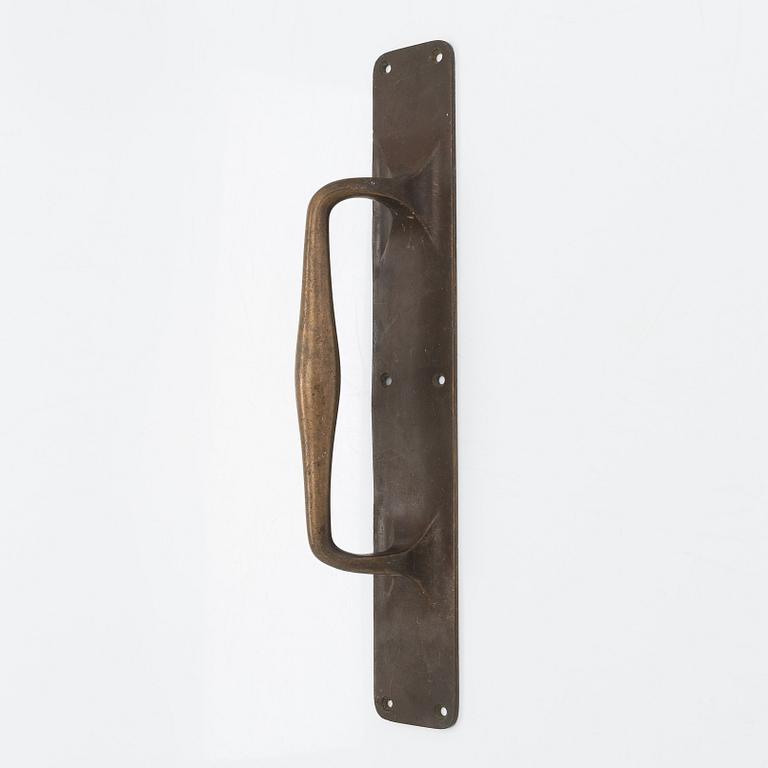 An Art Nouveau door handle from early 20th century.