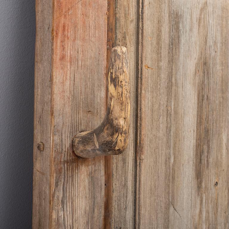 A pinted pine door, 18th /19th Century.