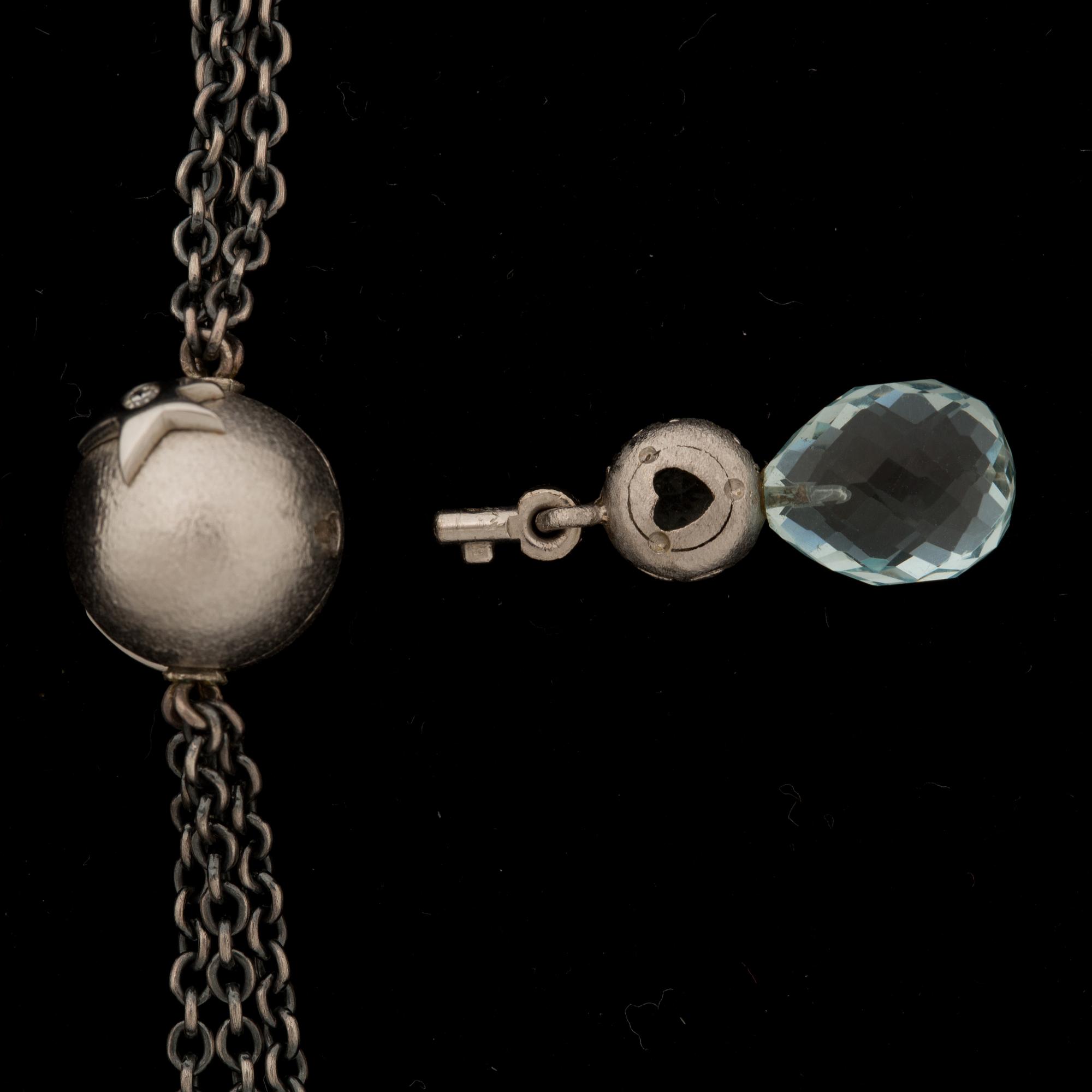 COLLIER, kullås 18k vitguld med 2 mindre diamanter, hänge med akvamarin. Ole Lynggaard, Köpenhamn. Vikt ca 18 g.