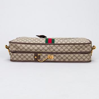 Gucci, a 'Savoy' garment bag.
