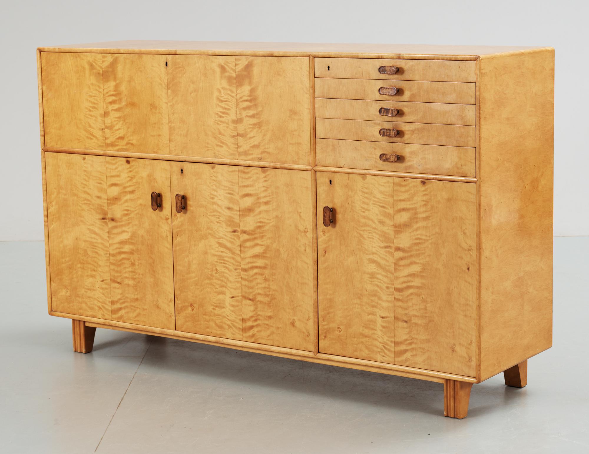 An Axel Larsson birch cabinet by Svenska Möbelfabrikerna Bodafors, ca 1935.