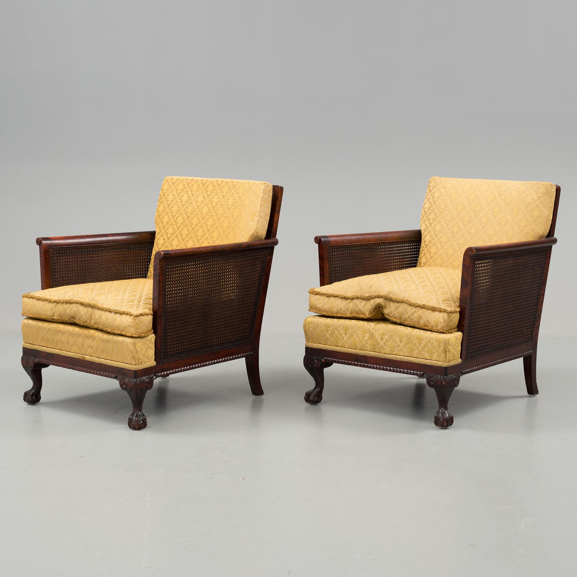 a pair of chippendale style armchairs from the 1930's/-40's.