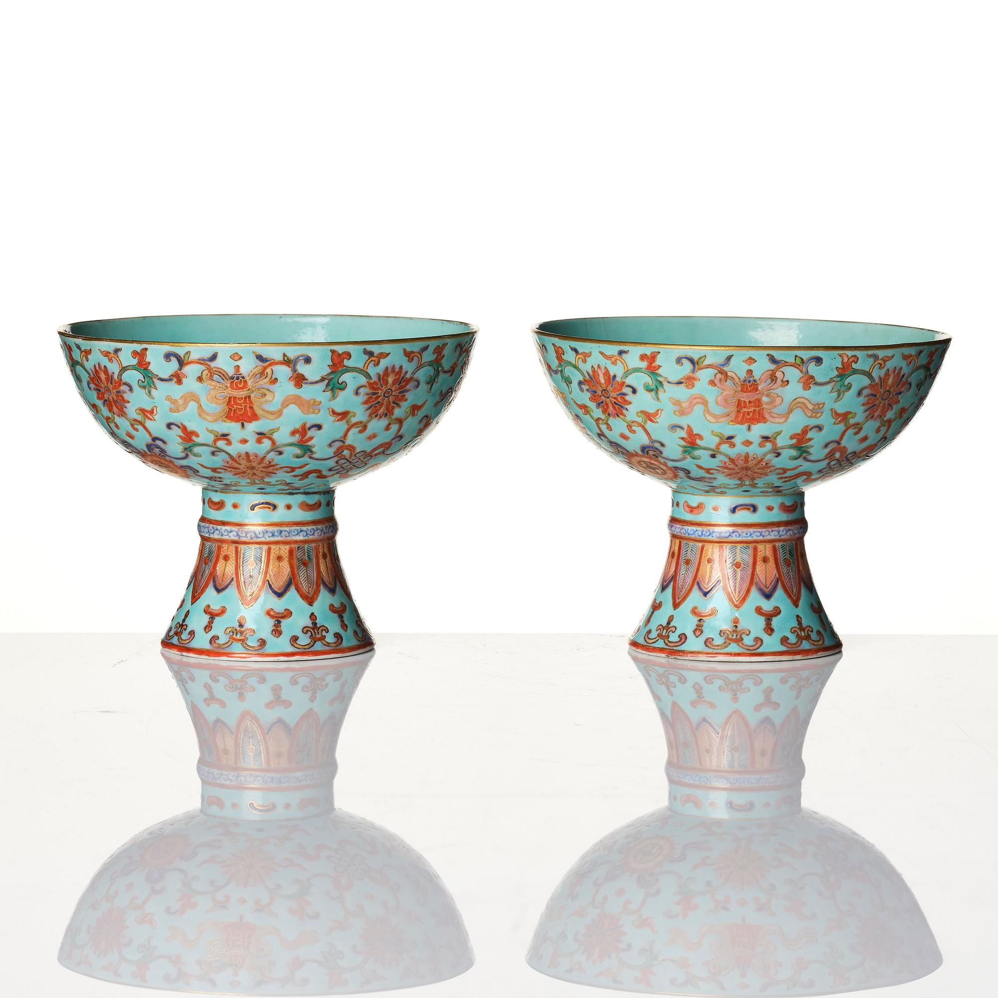A pair of rare turquoise ground 'baijiaxiang' stemcups, Qing dynasty with Daoguang mark and period (1821-1850).
