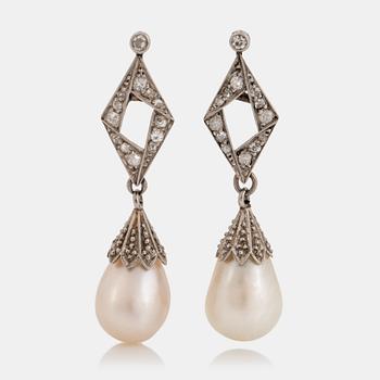 848. A pair of platinum and natural pearl earrings.