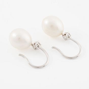 Earrings, 18K white gold with oval cultured pearls and brilliant-cut diamonds.
