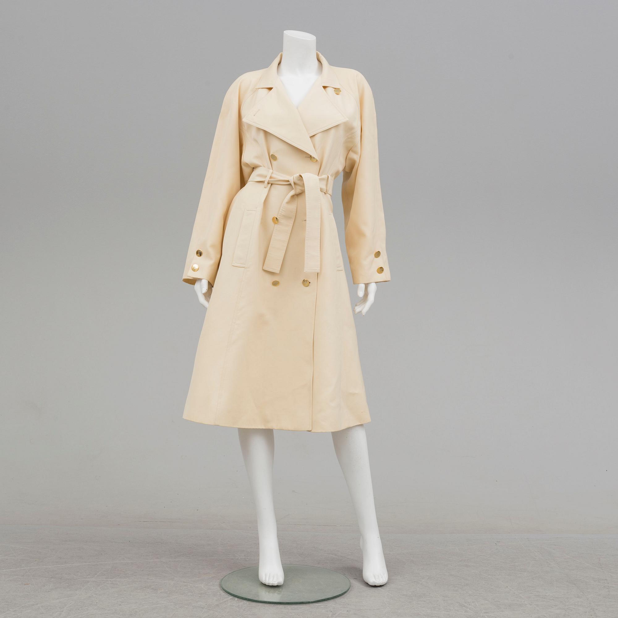 A trench-coat by Guy Laroche.