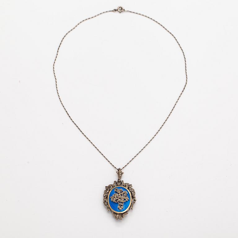 A necklace and a pair of earrings made of silver with enamel and marcasites. Paris, turn of the 20th century.