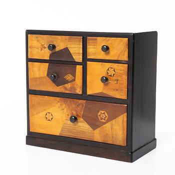 A Japanese miniature chest of drawers, first part of the 20th century.