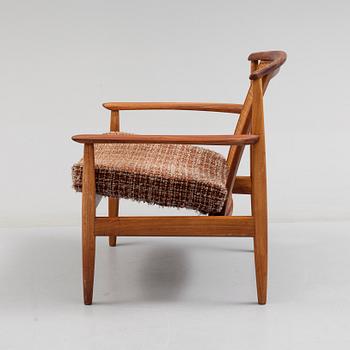 FOLKE OHLSSON, a teak and rattan easy chair from 1960's.