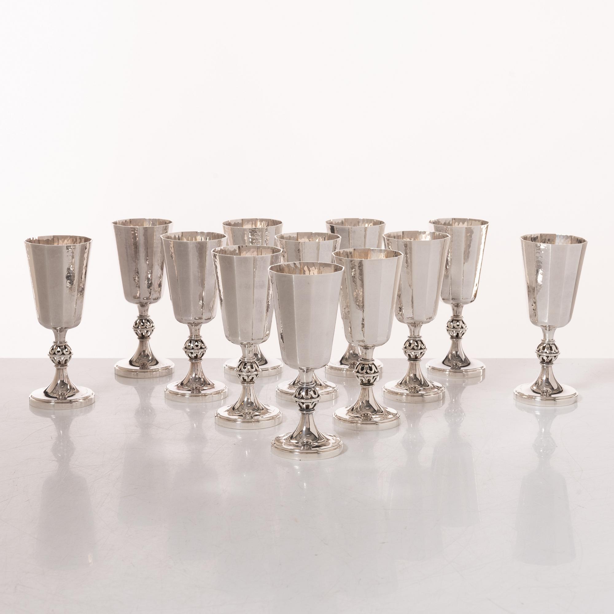 Eric Löfman, A set of twelve silver vodka glasses, KG Markströms, Uppsala 1972.