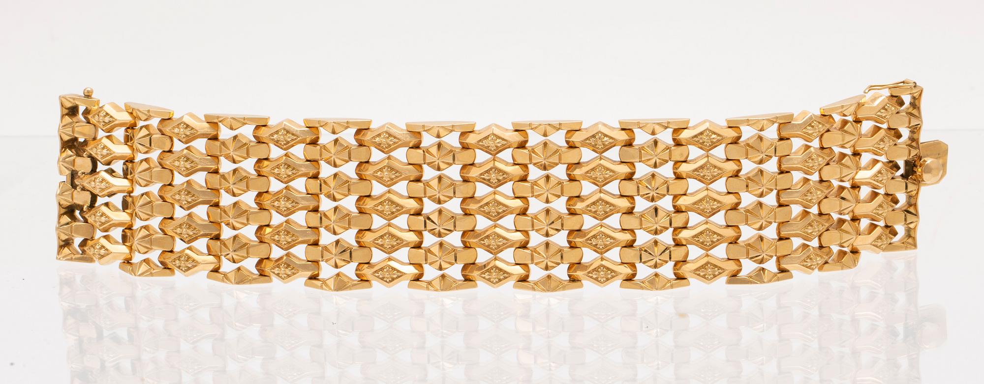 An 18C gold bracelet weight 67,6 grams length 19,5 cm.