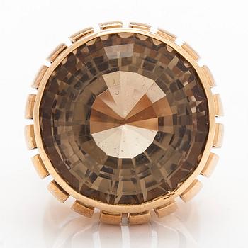 A 14K gold ring with smoky quartz. Kaisaniemen Kello ja Kulta 1962.