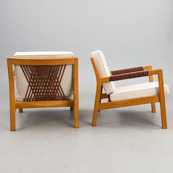 A pair of Mid-Century Rialto Armchairs, manufacturer Puunveisto Oy - Träsnideri Ab, Finland.