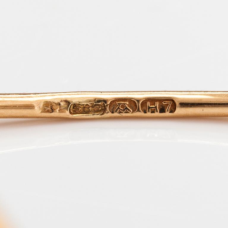 Elis Kauppi, A 14K gold bracelet/bangle with tiger's eyes. Kupittaan kulta, Turku 1961.