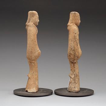 A pair of potted tomb figures of a guardiens, Han dynasty (206 B.C. - 220 A.D.).
