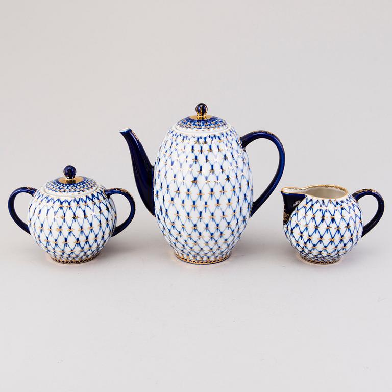 A 22-piece Lomonosov Cobalt Net porcelain set for coffee and tea, USSR.