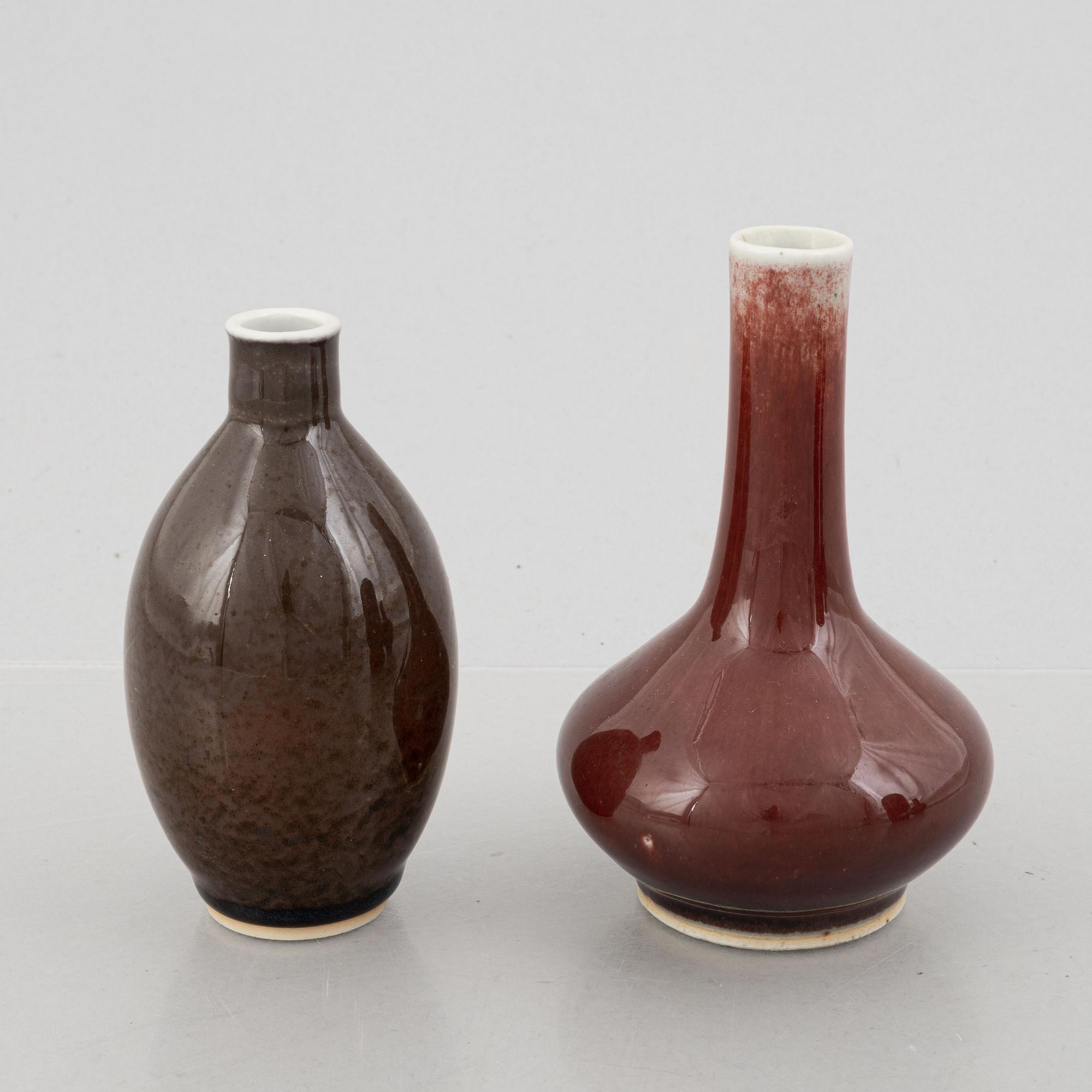 Four oxblood glazed porcelain vases, China, 20th century.