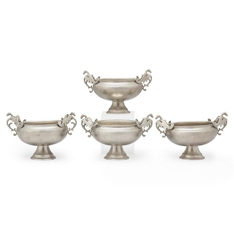 A set of four pewter stem cups by G F Baumann, master 1789.