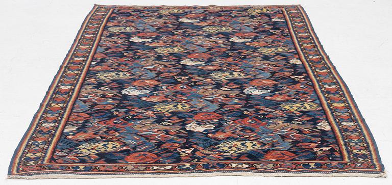 A Kilim rug, Senneh, approx. 199 x 132 cm.