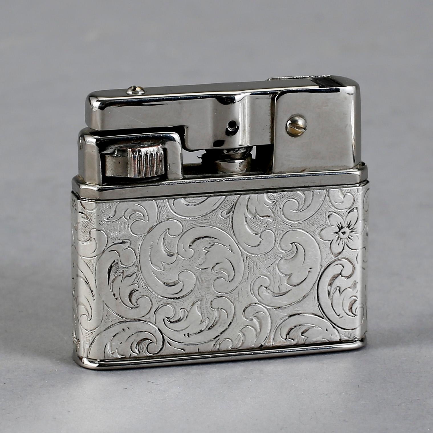 CIGARETTETUI och CIGARETTTÄNDARE, silver, 1900-talets första hälft.
