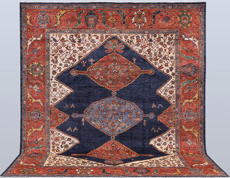 A Zigler, Heris Design carpet, 298 x 247 cm.
