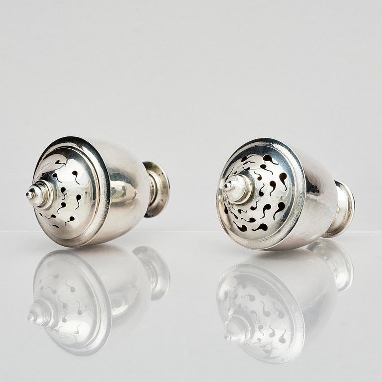 Georg Jensen, a pair of silver casters, design Johan Rohde, Copenhagen 1915-1921.