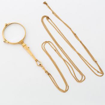 18K gold lornet.