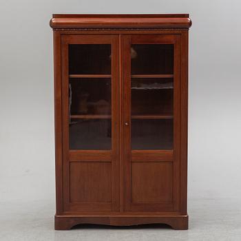 A first half of the 20th century mahogany veneered display cabinet.