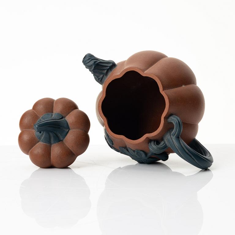 A Chinese yixing 'gourd' teapot, four cups and three saucers, 1980s.