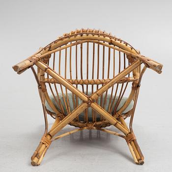 A wicker chair, mid 20th century.