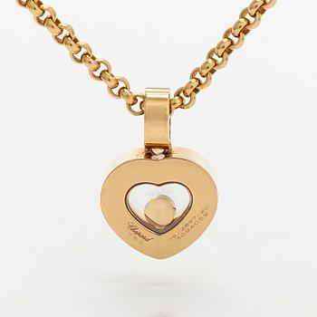 Chopard, an 18K gold 'Happy Diamonds' necklace with a heart pendant, and brilliant-cut diamond approximately 0.05 ct.