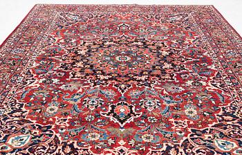 A Persian carpet. ca 400 x 260 cm.