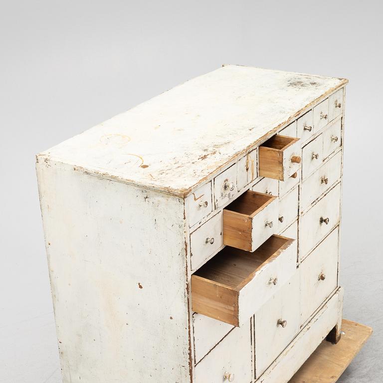 A painted chest of drawers, 20th Century.