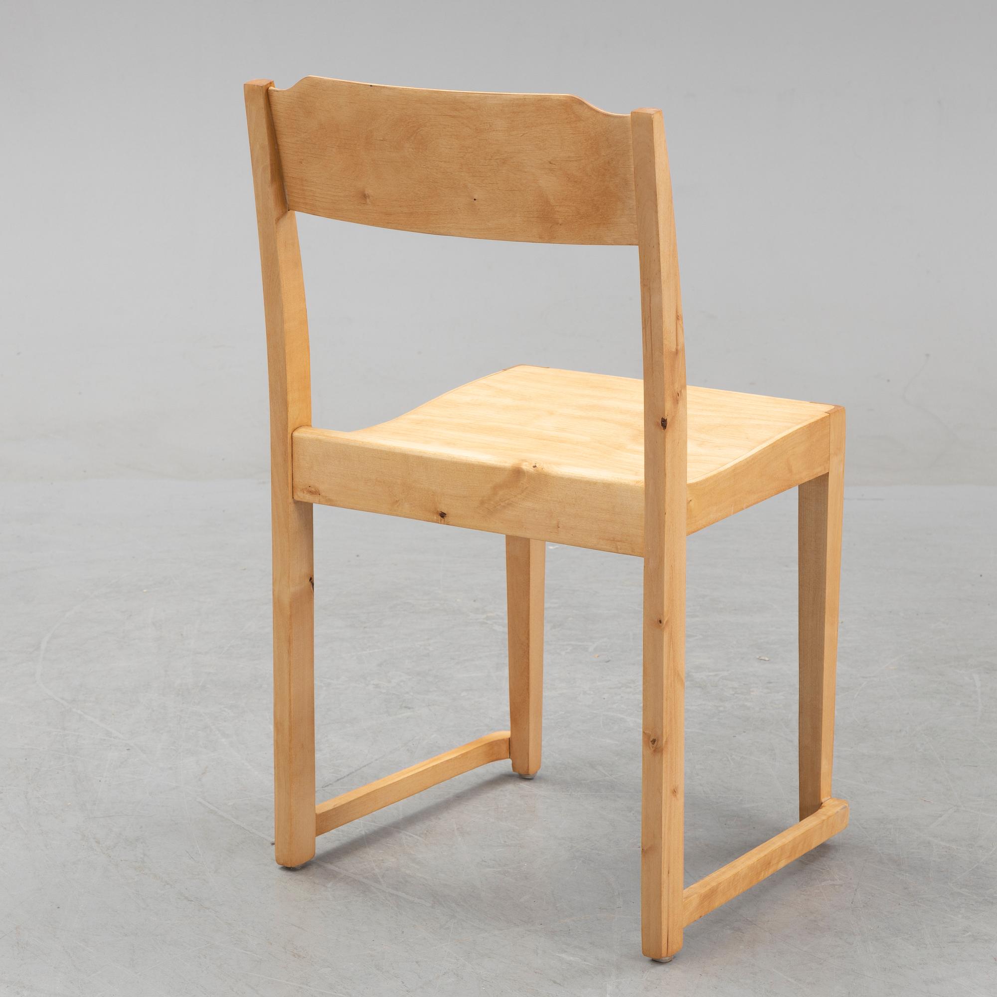 A set of five stackable birch chairs, mid 20th Century.