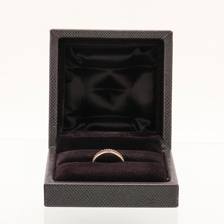 A “Quatre” ring in 18K yellow, pink, white gold and brown PVD by Boucheron.