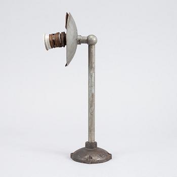 A set of four metal wall lights, first half of the 20th century.