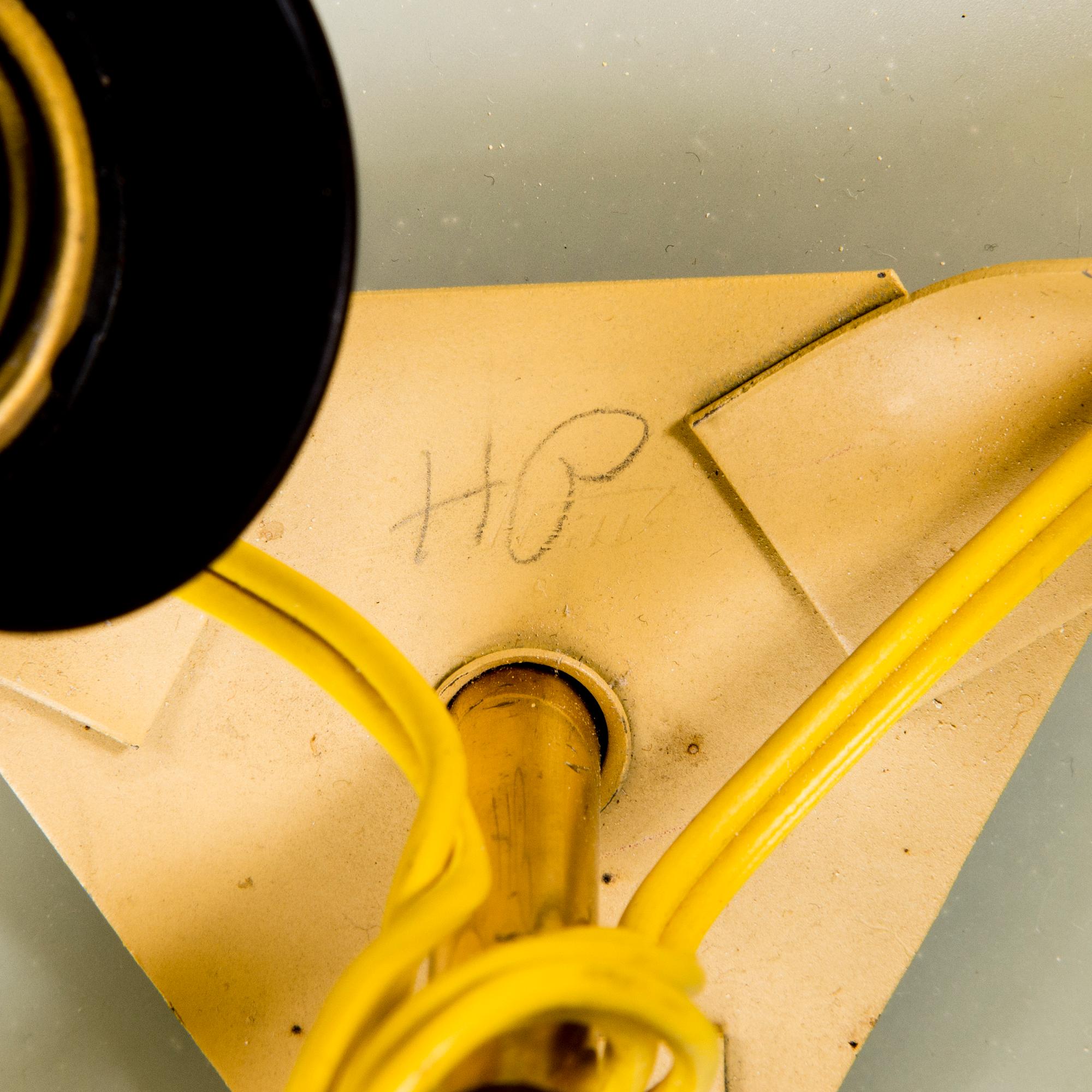 A mid-20th century ceiling light for Itsu Finland.