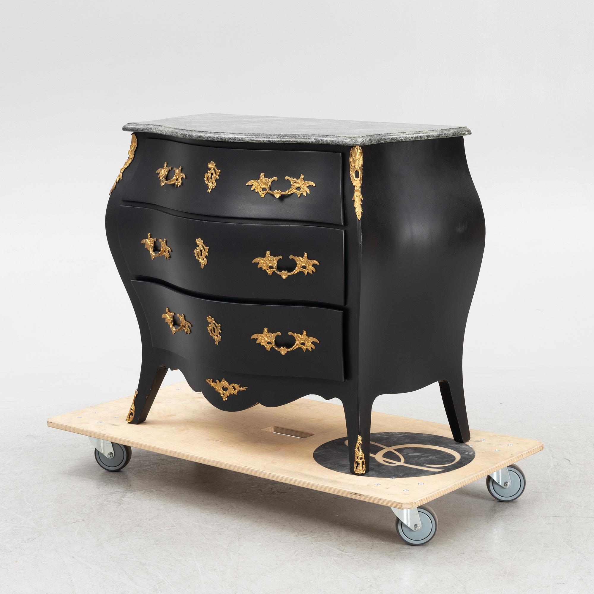 A Rococo style chest of drawers, mid 20th Century.