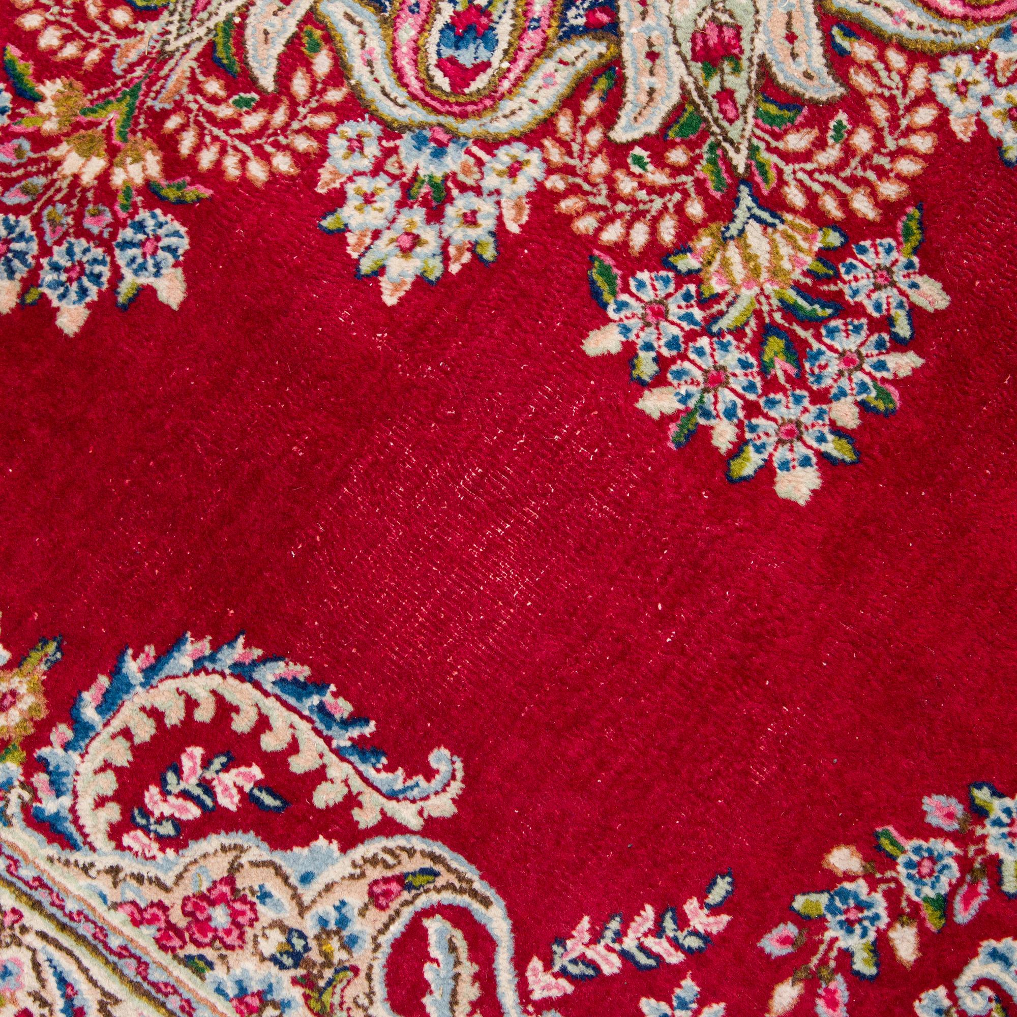 A carpet, Kirman, ca. 333 x 244 cm.