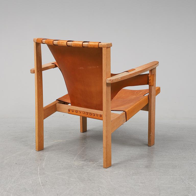 CARL-AXEL ACKING, an oak and leather 'Trienna' easy chair from Källemo.