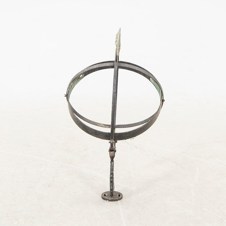 A mid 1900s copper sun dial.