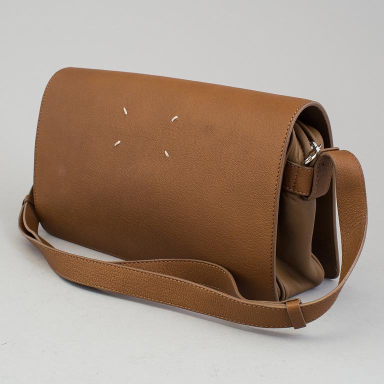 a Maison Martin Margiela leather bag.