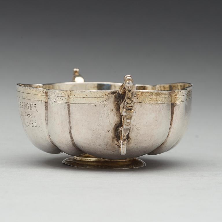 A German 17th century parcel-gilt silver brandy-bowl, unmarked, dated 1636.