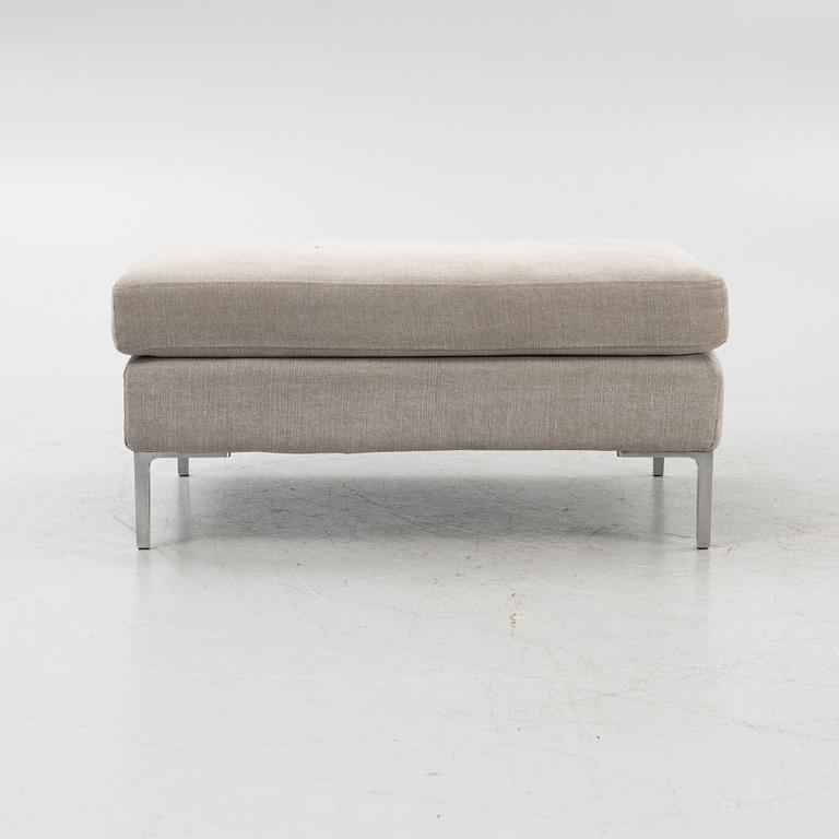 A 'Curve' sofa with a foot stool, Ire, 21st Century.