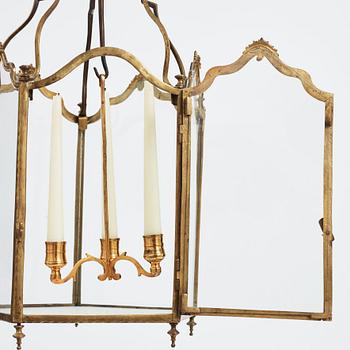 A Louis XV-style three-light lantern, 19th century.