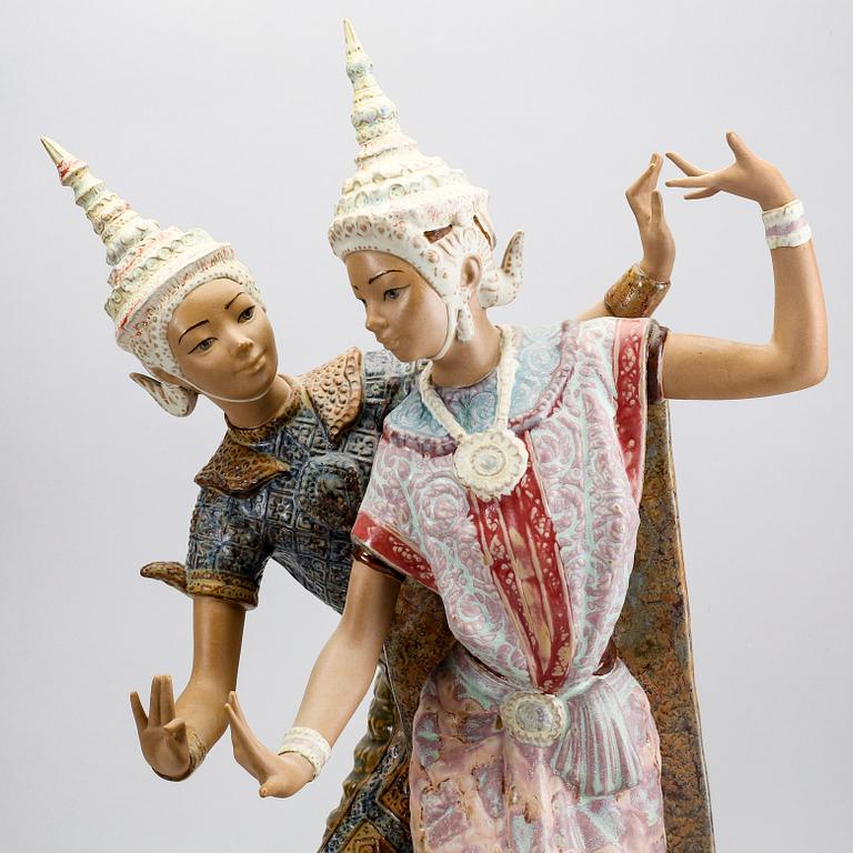 A Lladro stone ware figurine.