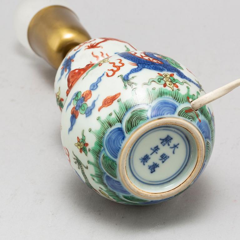 A Chinese porcelain wucai double gourd vase, turned into a table lamp, 20th century.