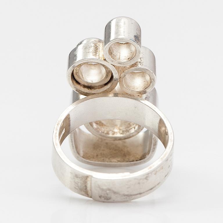 Elis Kauppi, A sterling silver ring "Mountain stream" with rock crystal. Kupittaan kulta, Turku.