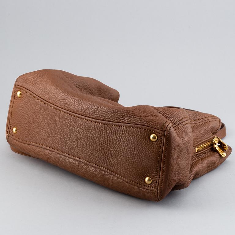 Miu Miu, a leather bag.