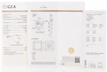 platinum ring with yellow radiant-cut diamond and brilliant cut diamonds.